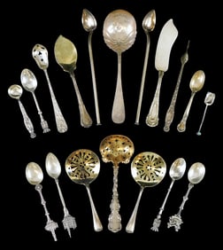 SILVER: Eighteen pieces of sterling and tested silver flatware and serving pieces, maker's include