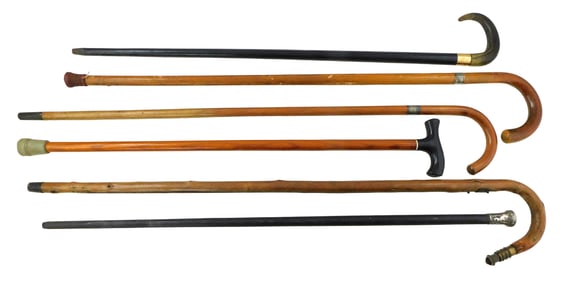 Six walking sticks, details include: two canes with monogrammed sterling silver bands; walking stick