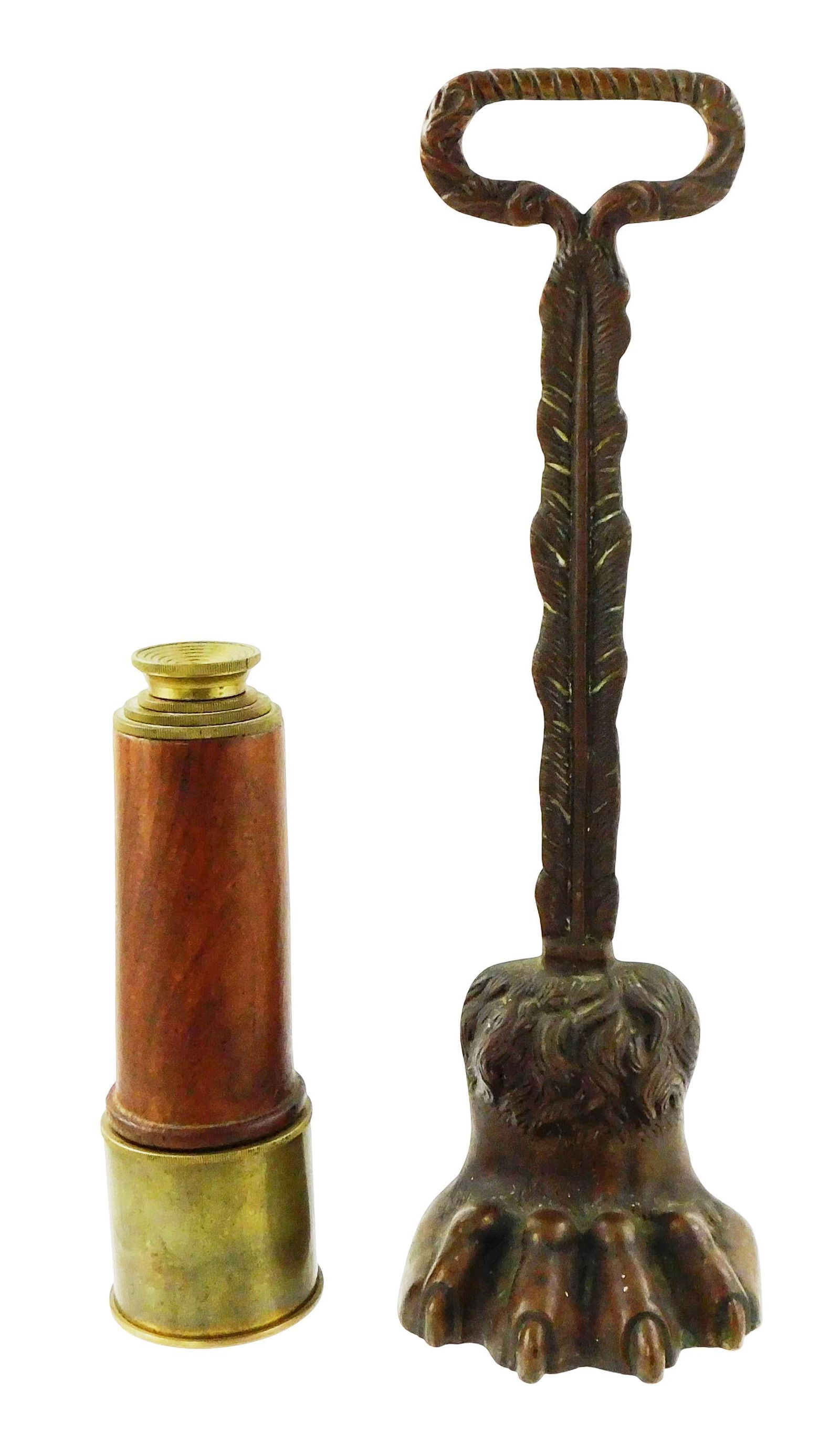 Brass telescope and paw doorstop, mid/late-19th C., telescope in multi-draw design with wooden grip: Brass telescope and paw doorstop, mid/late-19th C., telescope in multi-draw design with wooden grip and four expanding brass sections, no etchings or marks viewed, some wear to brass, 16 ½&rdqu
