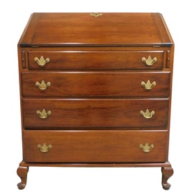 +Slant front desk, American, 20th C., Queen Anne style, bench made in walnut and sycamore,