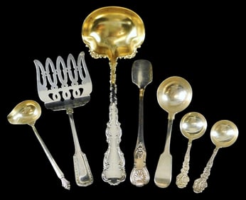 STERLING: Tiffany & Co., Georg Jensen, Gorham, Whiting, etc., seven pieces of ornate serving ware,