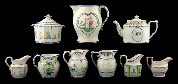 Castleford-type creamware with polychrome glaze trim and details, 19th C., nine pieces including:
