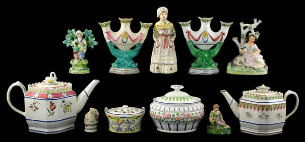 Staffordshire, etc., Eleven Continental porcelain pieces, details include: two Regency teapots with