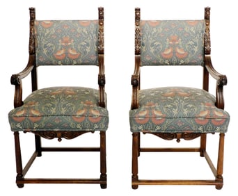 Pair of armchairs in Tudor style, 19th C., walnut, carved rear stiles with king and queen faces and