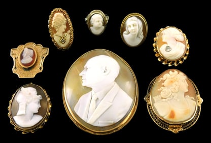 JEWELRY: Eight Cameo pin/pendants and rings, in tested or stamped 14K gold frames, all set with