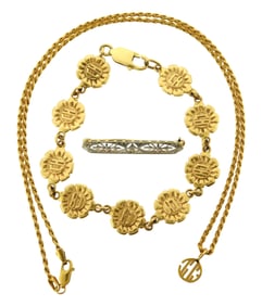 JEWELRY: Three pieces of 14K jewelry including spiral chain necklace with pendant, floral link