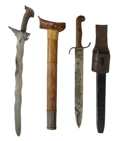 WEAPONS: Two Asian swords, including: Moro Kris sword, Philippines, double edged blade with wave
