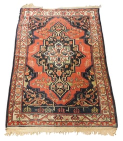 RUG: Antique Persian tribal Heriz style rug, 6' 6" x 4' 5", wool on cotton, central medallion on a