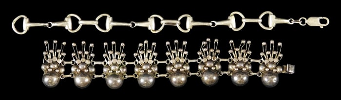 STERLING: Two Mexican sterling link bracelets: first a Taxco bracelet with floral design, no maker's