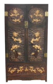 ASIAN: Chinese two door cabinet with carved dragon panels, deep reddish finish with contrasting