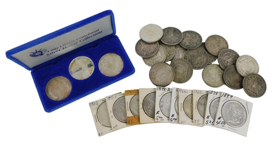 COINS: Thirty Morgan & Peace silver dollars, and one commemorative silver dollar. All are common