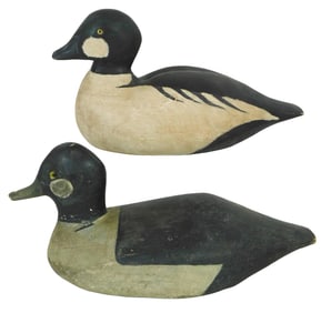 Two duck decoys, including: golden eye decoy, John Schmidt, "Common Golden eye ad. (symbol for