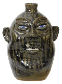 FACE JUG: Cleater (Georgia, 1921-2003) and Billie (Georgia, b.1922) Meaders, "Tobacco-Spit Face