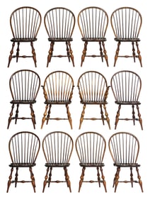 D.R. Dimes, twelve Windsor dining chairs, 20th C., including: two continuous arm chairs and ten side