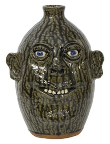 FACE JUG: Cleater (Georgia, 1921-2003) and Billie (Georgia, b.1922) Meaders, "Smiling Face with Blue
