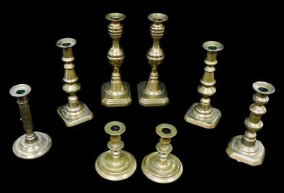 Eight brass candlesticks, 19th to early 20th C., American and English style, three pairs and two