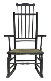 Windsor rocker, American, c. 1840, comb-back in black paint with painted rush seat, turned arm