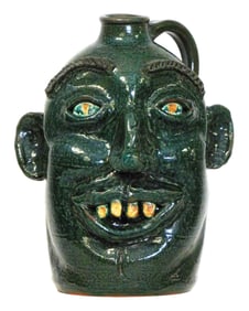FACE JUG: Kim T. Black (Georgia, 20th/ 21st C.), "Buck Tooth Face Jug", 1999, folk art glazed