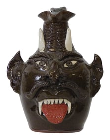 FACE JUG: Albert Hodge (Vale, N.C., b. 1941) "Devil Pitcher with Tongue", folk art pottery pitcher,