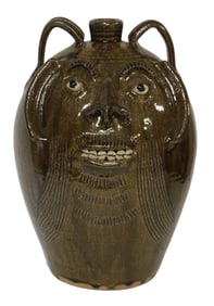 FACE JUG: Steve Abee (Lenoir, N.C., b. 1968) large folk art pottery jug, brown tobacco spit glaze,