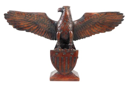 Folk art carved eagle, 19th C., signed “G. Wade 1863”, eagle with spread wings standing