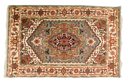 RUG: Agra Serapi, 3' 9" x 6', wool on cotton, central medallion on a light blue field, cream border