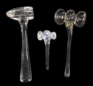 ART GLASS/WHIMSEYS: Lot of three art glass tools, including: hammer in solid clear glass 10" l.;