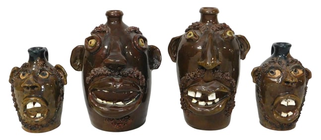 FACE JUGS: Four Seagrove, NC folk art pottery jugs, probably by Walt and Dot Auman, each signed