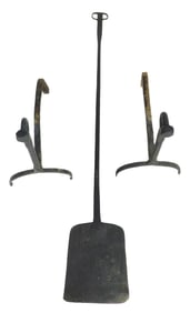 Two iron fireplace tools, American, including: peel with ram's horn end, surface wear and wear to