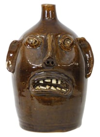 FACE JUG: Evan Javan Brown Sr (Arden, N.C., 1897-1980) folk art pottery jug, mottled light and dark