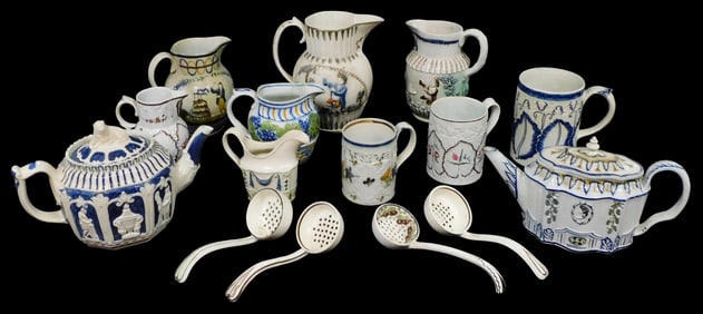 Pratt Ware-style polychrome ceramic pieces, fifteen total, with relief designs in an assortment of