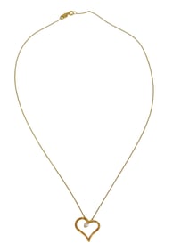 JEWELRY: 18K Hearts on Fire heart pendant with chain, open heart pendant stamped and tested “