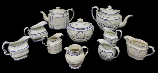 Castleford-type creamware with blue glaze trim, 19th C., ten pieces including: two teapots, one