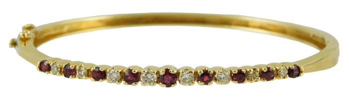 JEWELRY: 14K ruby and diamond bangle bracelet, hinged bangle bracelet with box safety clasp, stamped