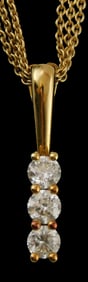 JEWELRY: 18K diamond pendant with chain, three-diamond pendant with attached bail, stamped and