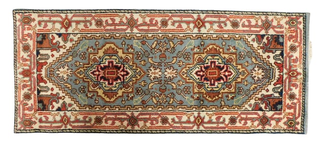 RUG: Agra Serapi, 2' 5" x 5' 10", wool on cotton, two central medallions on a blue field. cream