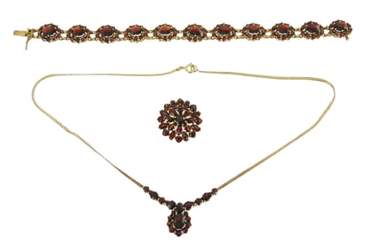 JEWELRY: 800 gilt silver and garnet jewelry suite: bracelet, necklace and pin, stamped and tested