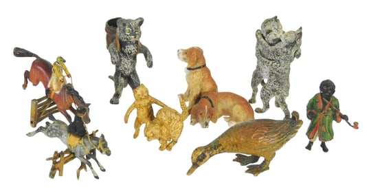 Eight cast metal miniature figurines, 19th/20th C., most with painted details, details include: