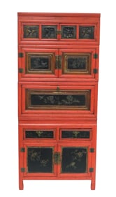 ASIAN: Four section stacking cabinet, 20th C., red painted wood with carved black panels, wear