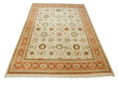 RUG: Modern decorative Persian style carpet, 16' x 12', wool on cotton, cream ground with red border