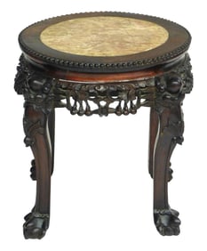 ASIAN: Chinese marble top table or plant stand, early 20th C., carved wood frame, skirt, and legs,