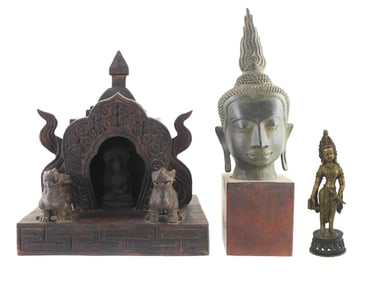ASIAN: Three metal sculptures: Thai Buddha head with flame, cast form mounted on wood block, crack i