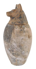 Egyptian canopic jar, New Kingdom style, with head of Jackal, the god Duamutef, one of the four sons