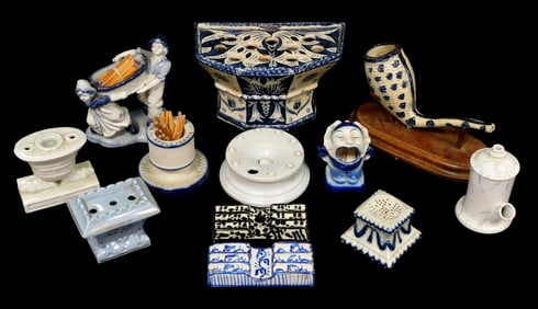 Twelve ceramic desk top accessories, includes: Quimper delftware flower brick, "HenRiot Quimper"
