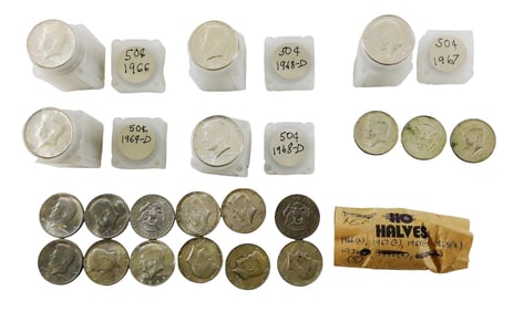 COINS: Lot of 40% silver 50c 1965 to 1969 dates. Grades range from Very Fine to Uncirculated.