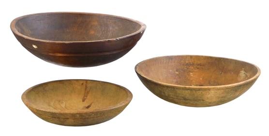 TREENWARE: Three turned treen bowls, all graduated circular form, two with incised line to exterior