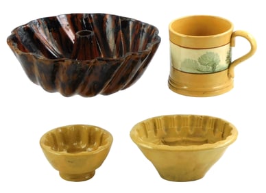 Assorted pottery, four pieces, details including: yellowware mug with green seaweed decoration,