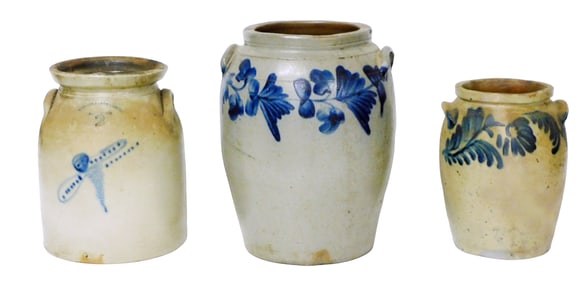 Three salt-glazed stoneware crocks, all with cobalt decoration and lug handles, including: Seymour &