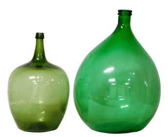 GLASS: Two early demijohn bottles, both in green molded glass, one with double ring lip and the