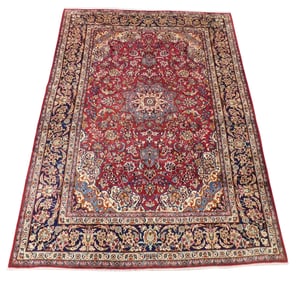 RUG: Isfahan carpet, 8' x 11', wool on cotton, classic geometric design with central medallion on
